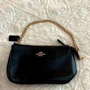 Authentic coach leather handbag. Larger than a wristlet, great for a fancy event